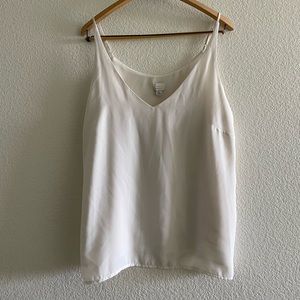White tank top V-neck “A New Day” business casual.